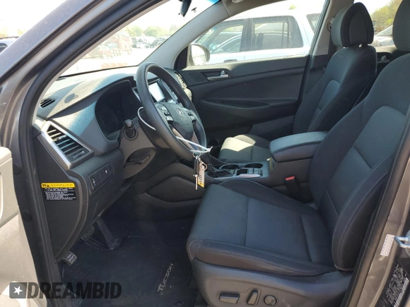 2018 Hyundai Tucson SEL with VIN KM8J3CA41JU784239, listed as a Copart auction lot 54331525 with 63,121 mi miles and Salvage title. Bid and sale history available at DreamBid. Image 7.