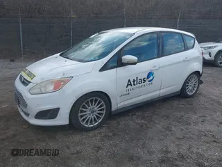 2013 Ford C-Max SE with VIN 1FADP5AU0DL516008, listed as a IAAI auction lot 41536951 with 209,923 mi miles. Bid and sale history available at carsss.com. Image 2.