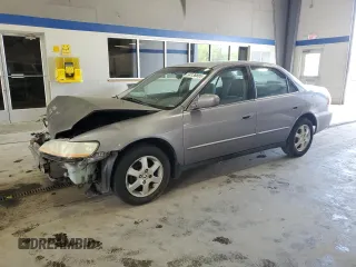 2000 Honda Accord SE with VIN 1HGCG5670YA817440, listed as a Copart auction lot 54138885 with 239,912 mi miles and Salvage title. Bid and sale history available at DreamBid. Image 1.