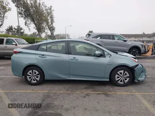 2017 Toyota Prius Two with VIN JTDKARFU7H3052594, listed as a IAAI auction lot 42035969 with 50,789 mi miles and . Bid and sale history available at DreamBid. Image 13.