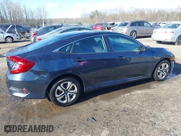 2017 Honda Civic LX with VIN 19XFC2F52HE069033, listed as a IAAI auction lot 41866390 with 68,050 mi miles and . Bid and sale history available at DreamBid. Image 14.