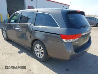 2014 Honda Odyssey EX-L z VIN 5FNRL5H64EB031426, wystawiony jako IAAI lot #41777542 z przebiegiem 162 426 mil mil oraz . Historia ofert i sprzedaży dostępna na DreamBid. Obrazek 3.