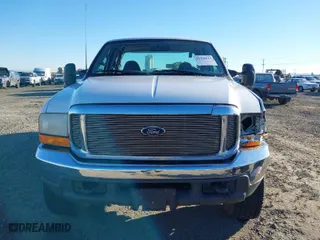 1999 Ford Super Duty F-250 XL with VIN 1FTNX21F4XED35890, listed as a IAAI auction lot 41420623 with 214,432 mi miles. Bid and sale history available at carsss.com. Image 12.