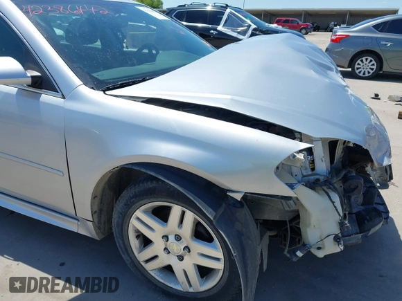 2014 Chevrolet Impala LT z VIN 2G1WB5E31E1180551, wystawiony jako IAAI lot #42386442 z przebiegiem 130 545 mil mil oraz . Historia ofert i sprzedaży dostępna na DreamBid. Obrazek 19.
