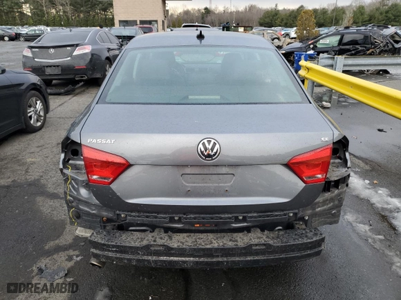 2014 Volkswagen Passat SE with VIN 1VWBP7A38EC018710, listed as a Copart auction lot 42289915 with 100,595 mi miles and Salvage Title. Bid and sale history available at carsss.com. Image 6.