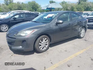 2012 Mazda 3 i Grand Touring with VIN JM1BL1W8XC1577118, listed as a IAAI auction lot 42349406 with 107,373 mi miles and . Bid and sale history available at DreamBid. Image 2.