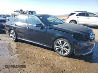 2015 Mercedes-Benz E 350 Luxury with VIN WDDHF8JBXFB097002, listed as a Copart auction lot 82178534 with 161,315 mi miles and Salvage title. Bid and sale history available at DreamBid. Image 4.