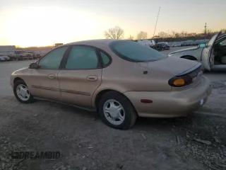 1997 Ford Taurus GL z VIN 1FALP52U9VG142664, wystawiony jako Copart lot #84054224 z przebiegiem 151 610 mil mil oraz Czysty tytuł • Clean title. Historia ofert i sprzedaży dostępna na DreamBid. Obrazek 2.