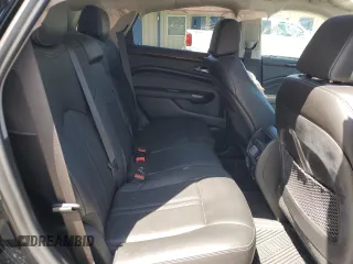 2014 Cadillac SRX Luxury Collection z VIN 3GYFNEE32ES647165, wystawiony jako Copart lot #52331335 z przebiegiem 27 277 mil mil oraz Szkoda całkowita • Salvage title. Historia ofert i sprzedaży dostępna na DreamBid. Obrazek 11.
