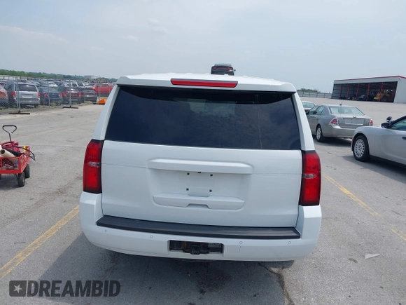 2018 Chevrolet Tahoe Commercial z VIN 1GNSKDEC8JR238969, wystawiony jako IAAI lot #42440047 z przebiegiem 126 373 mil mil oraz . Historia ofert i sprzedaży dostępna na DreamBid. Obrazek 16.