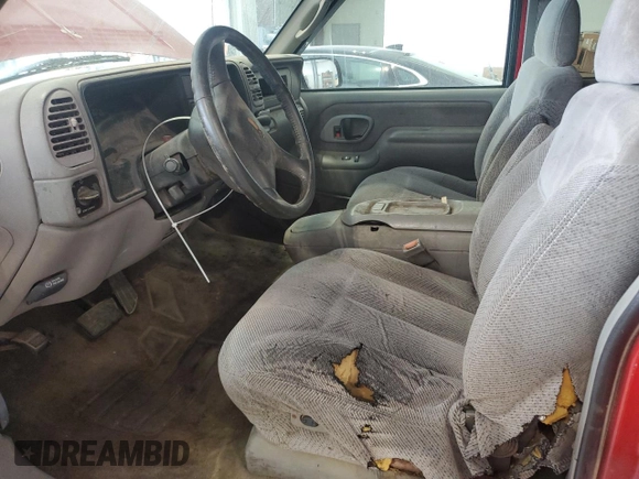 1999 GMC Sierra 2500 z VIN 1GTGK29R3XF020000, wystawiony jako Copart lot #53698755 z przebiegiem 241 366 mil mil oraz Szkody całkowita. Historia ofert i sprzedaży dostępna na DreamBid. Obrazek 7.