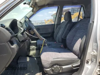 2002 Honda CR-V LX with VIN JHLRD68512C025394, listed as a Copart auction lot 67161964 with 143,660 mi miles and Salvage Title. Bid and sale history available at DreamBid. Image 7.