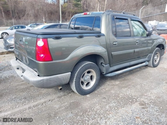 2004 Ford Explorer Sport Trac XLS with VIN 1FMZU77K84UA90732, listed as a IAAI auction lot 41697337 with 73,071 mi miles. Bid and sale history available at carsss.com. Image 4.
