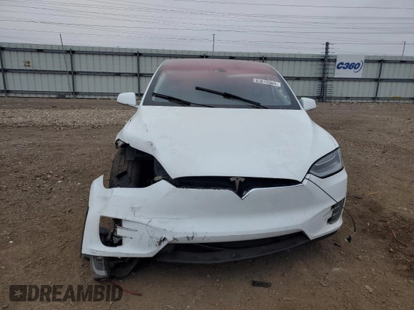 2016 Tesla Model X 70D z VIN 5YJXCBE25GF016928, wystawiony jako Copart lot #83615564 z przebiegiem Nie podano mil oraz Szkoda całkowita • Salvage title. Historia ofert i sprzedaży dostępna na DreamBid. Obrazek 5.