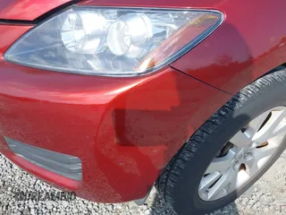 2007 Mazda CX-7 Sport with VIN JM3ER293770139953, listed as a IAAI auction lot 42003213 with 141,217 mi miles. Bid and sale history available at carsss.com. Image 6.