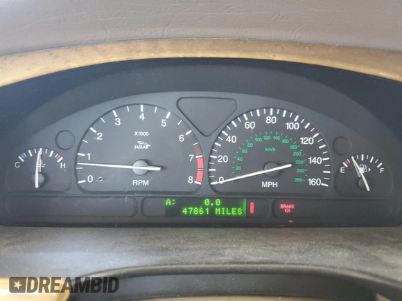 2000 Jaguar S-Type V8 z VIN SAJDA01D7YGL39410, wystawiony jako Copart lot #56814185 z przebiegiem 47 861 mil mil oraz Szkoda całkowita • Salvage title. Historia ofert i sprzedaży dostępna na DreamBid. Obrazek 9.