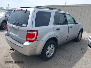 2011 Ford Escape XLT with VIN 1FMCU9D72BKB26103, listed as a IAAI auction lot 41927641 with 205,543 mi miles. Bid and sale history available at carsss.com. Image 4.