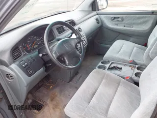 2000 Honda Odyssey EX z VIN 2HKRL1879YH516264, wystawiony jako IAAI lot #42109480 z przebiegiem 214 414 mil mil oraz . Historia ofert i sprzedaży dostępna na DreamBid. Obrazek 5.
