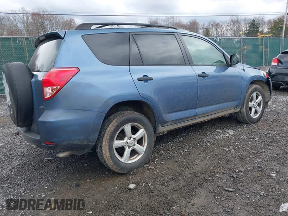 2006 Toyota RAV4 with VIN JTMBK33VX65003043, listed as a IAAI auction lot 42009844 with 294,380 mi miles. Bid and sale history available at carsss.com. Image 4.
