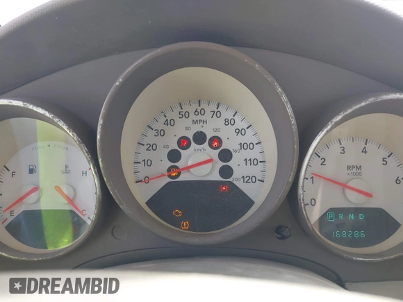2009 Dodge Caliber SXT z VIN 1B3HB48A69D168427, wystawiony jako IAAI lot #42156117 z przebiegiem 168 286 mil mil oraz . Historia ofert i sprzedaży dostępna na DreamBid. Obrazek 7.