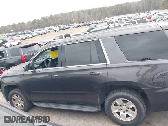 2017 Chevrolet Tahoe Commercial with VIN 1GNLCDEC0HR303602, listed as a IAAI auction lot 41718630 with 196,484 mi miles and . Bid and sale history available at DreamBid. Image 14.