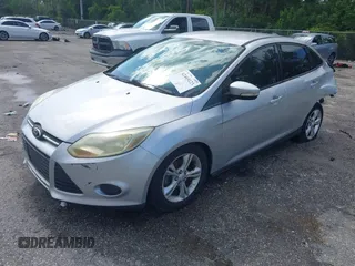 2013 Ford Focus SE with VIN 1FADP3F28DL217636, listed as a IAAI auction lot 42465123 with 187,088 mi miles and . Bid and sale history available at DreamBid. Image 2.