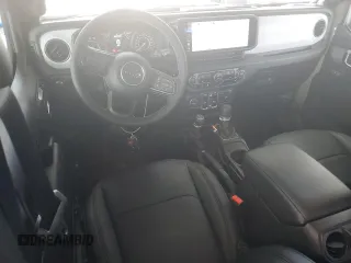 2025 Jeep Wrangler Sport S with VIN 1C4PJXDG7SW536309, listed as a Copart auction lot 53847575 with 1,476 mi miles and Salvage title. Bid and sale history available at DreamBid. Image 8.
