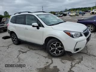 2015 Subaru Forester XT Touring with VIN JF2SJGUC5FH538188, listed as a Copart auction lot 57512555 with 94,236 mi miles and Salvage title. Bid and sale history available at DreamBid. Image 4.
