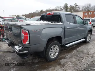 2018 GMC Canyon 4WD SLT with VIN 1GTG6DEN2J1301633, listed as a IAAI auction lot 41530624 with 98,771 mi miles. Bid and sale history available at carsss.com. Image 4.