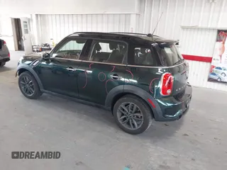 2013 MINI Countryman S with VIN WMWZC3C56DWP24170, listed as a IAAI auction lot 42366594 with 143,311 mi miles and . Bid and sale history available at DreamBid. Image 3.