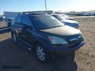 2009 Honda CR-V EX-L with VIN 5J6RE38769L018276, listed as a IAAI auction lot 41690588 with 152,784 mi miles. Bid and sale history available at carsss.com. Image 1.