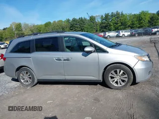 2014 Honda Odyssey EX-L with VIN 5FNRL5H61EB128311, listed as a IAAI auction lot 42334932 with 270,135 mi miles and . Bid and sale history available at DreamBid. Image 12.