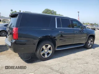 2017 Chevrolet Suburban Premier with VIN 1GNSCJKC8HR226797, listed as a Copart auction lot 62874585 with 150,994 mi miles and Salvage title. Bid and sale history available at DreamBid. Image 3.