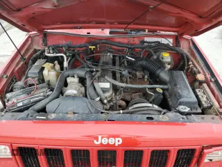 1999 Jeep Cherokee Sport with VIN 1J4FF68S1XL522902, listed as a Copart auction lot 55947745 with 212,357 mi miles and Non repairable. Bid and sale history available at DreamBid. Image 12.