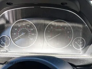 2014 BMW 4 Series 428i with VIN WBA3N7C50EK220438, listed as a IAAI auction lot 41990873 with 141,736 mi miles and . Bid and sale history available at carsss.com. Image 7.