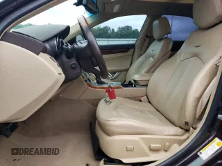 2009 Cadillac CTS RWD with VIN 1G6DV57V490111006, listed as a Copart auction lot 66313174 with 148,467 mi miles and Salvage Title. Bid and sale history available at DreamBid. Image 7.
