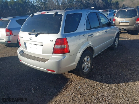 2009 Kia Sorento LX with VIN KNDJD735X95872078, listed as a IAAI auction lot 41201260 with 202,674 mi miles. Bid and sale history available at carsss.com. Image 4.