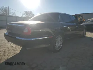 2005 Jaguar XJ VDP with VIN SAJWA82C75SG45094, listed as a Copart auction lot 83891564 with 57,467 mi miles and Salvage Title. Bid and sale history available at carsss.com. Image 3.