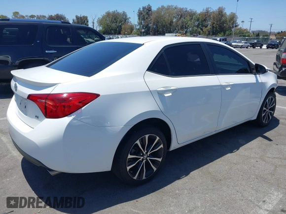2017 Toyota Corolla L with VIN 5YFBURHE0HP678511, listed as a IAAI auction lot 42519019 with 105,859 mi miles and . Bid and sale history available at DreamBid. Image 4.