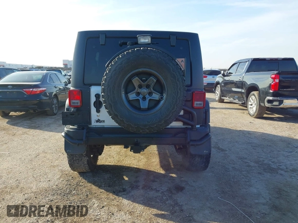 2013 Jeep Wrangler Unlimited Rubicon with VIN 1C4BJWFG0DL529739, listed as a IAAI auction lot 41587047 with 93,116 mi miles. Bid and sale history available at carsss.com. Image 16.