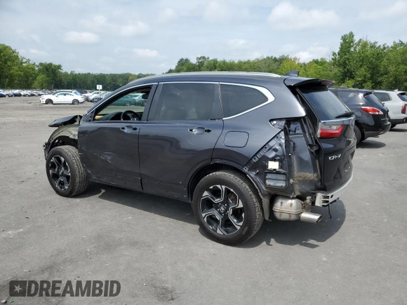 2018 Honda CR-V Touring with VIN 7FARW2H93JE048507, listed as a Copart auction lot 64071705 with 69,051 mi miles and Salvage title. Bid and sale history available at DreamBid. Image 2.