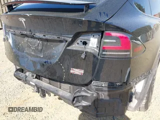 2022 Tesla Model X with VIN 7SAXCAE59NF346186, listed as a IAAI auction lot 41893923 with Not Provided miles and . Bid and sale history available at DreamBid. Image 13.