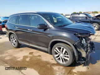 2017 Honda Pilot Elite with VIN 5FNYF6H04HB023609, listed as a Copart auction lot 52235425 with 107,997 mi miles and Salvage Title. Bid and sale history available at DreamBid. Image 4.