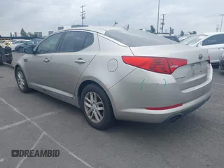 2013 Kia Optima LX with VIN KNAGM4A71D5414691, listed as a IAAI auction lot 41916576 with 245,851 mi miles. Bid and sale history available at carsss.com. Image 3.