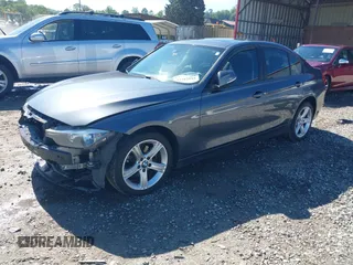 2014 BMW 3 Series 320i xDrive with VIN WBA3C3C54EP661409, listed as a IAAI auction lot 42182593 with 159,104 mi miles and . Bid and sale history available at DreamBid. Image 18.