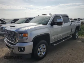 2019 GMC Sierra 3500HD Denali z VIN 1GT42WEY0KF252294, wystawiony jako Copart lot #76052204 z przebiegiem 61 881 mil mil oraz Nie do naprawy. Historia ofert i sprzedaży dostępna na DreamBid. Obrazek 1.
