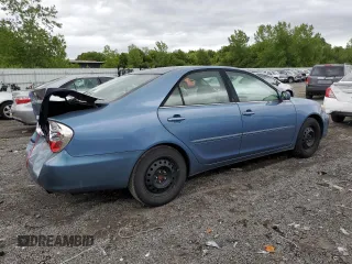 2004 Toyota Camry LE z VIN 4T1BE30K94U892207, wystawiony jako Copart lot #58406245 z przebiegiem 318 751 mil mil oraz Czysty tytuł • Clean title. Historia ofert i sprzedaży dostępna na DreamBid. Obrazek 3.