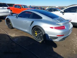2016 Porsche 911 Turbo S with VIN WP0AD2A93GS166450, listed as a IAAI auction lot 41301144 with 23,420 mi miles. Bid and sale history available at carsss.com. Image 3.