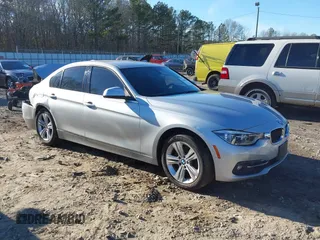 2018 BMW 3 Series 330i with VIN WBA8B9G58JNU97318, listed as a IAAI auction lot 41205434 with 62,582 mi miles. Bid and sale history available at carsss.com. Image 1.