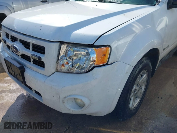 2011 Ford Escape Hybrid with VIN 1FMCU4K3XBKA75758, listed as a IAAI auction lot 42753145 with 170,554 mi miles and . Bid and sale history available at DreamBid. Image 6.